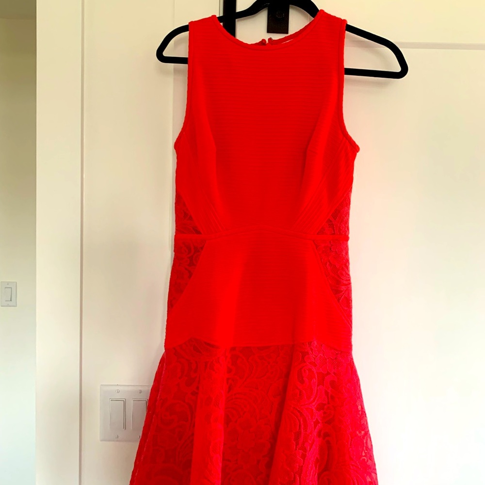 Coral dress, perfect for any occasion.
